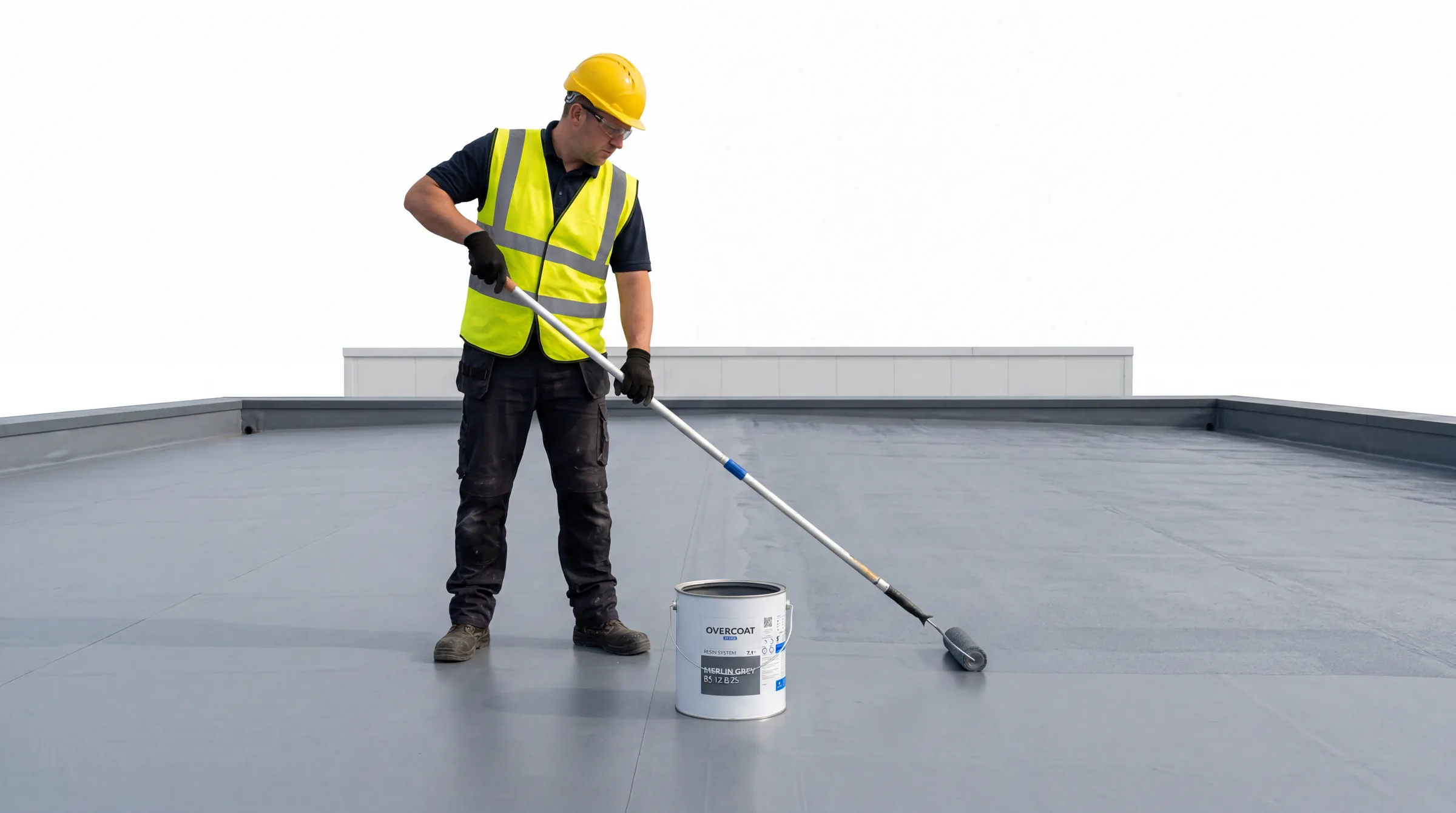 Roofing operative applying a cold-applied liquid resin coating to a grey flat roof with a roller