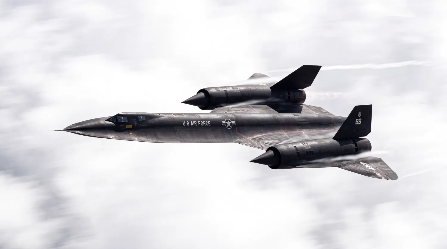 SR-71 Blackbird at speed through cloud, digital render